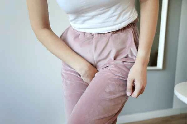 woman struggling with urine incontinence Mill Hill